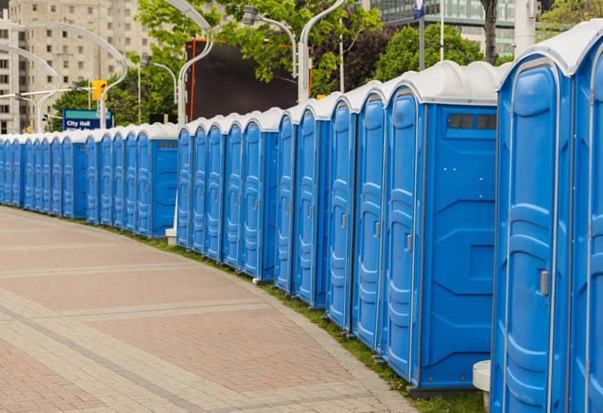 a row of portable restrooms at a fairground, offering visitors a clean and hassle-free experience in Camarillo